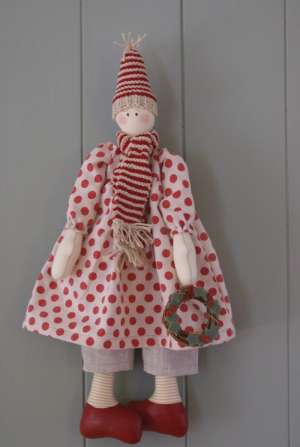 Yuletide Doll Doll patterns by Rosalie Quinlan.