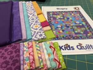 Bugsy Purple Quilt Kit. Pattern by Kids Quilts.
